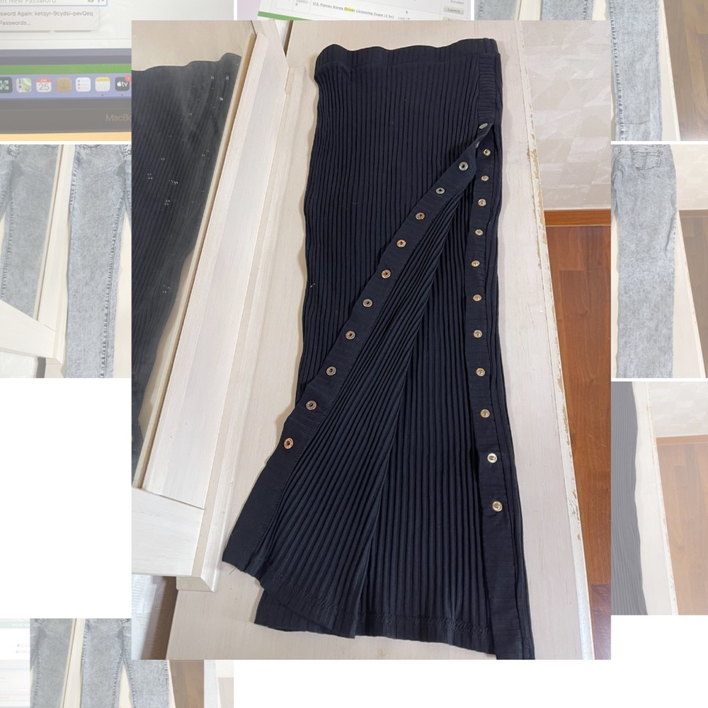 Black high slit skirt with clips.